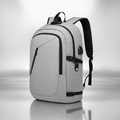 Gray backpack on shiny silver background