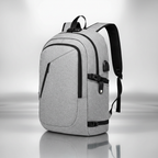 Gray backpack on shiny silver background